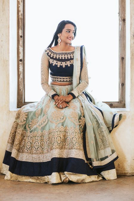 Black mint and gold lehenga for sister of the bride