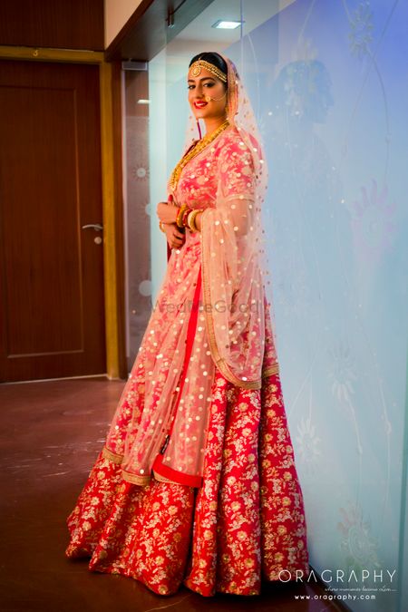 Red and gold sequin work bridal lehenga