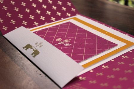 Photo of purple wedding cards