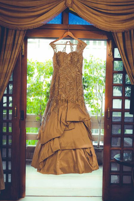 Layered dull gold cocktail gown