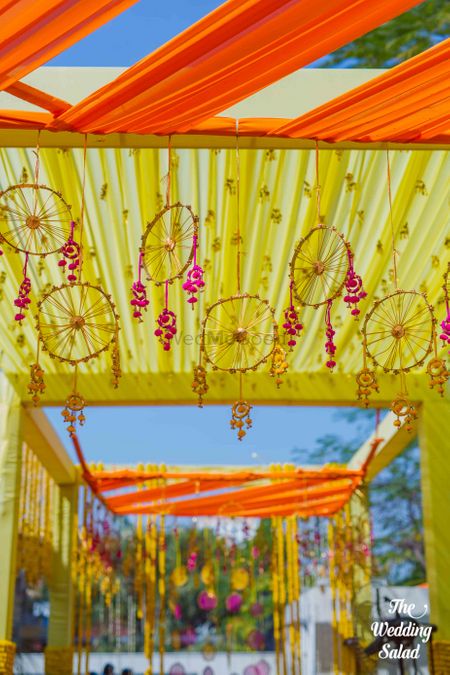 Hanging wheel decor on Mehendi