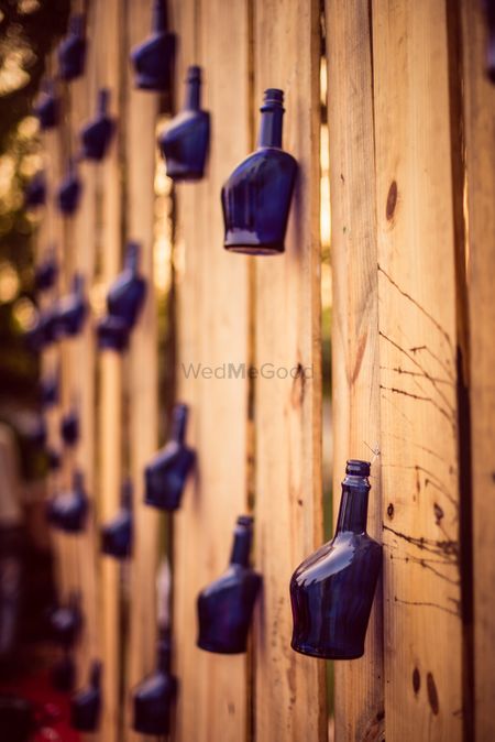 Blue hanging bottles in decor