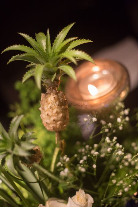 Miniature pineapple in table centrepiece 
