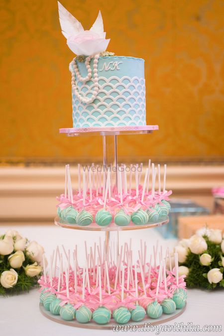 Unique cake with pastel lollipops