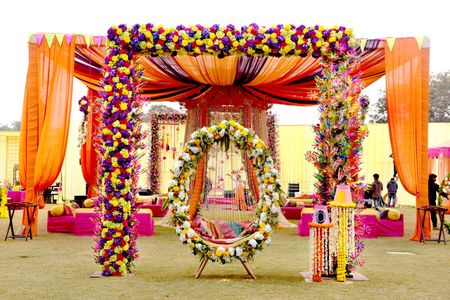 Photo of Round circular mehendi swing with florals
