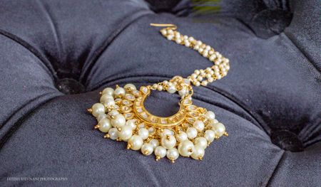 Photo of Gold and pearl jhoomer for bride