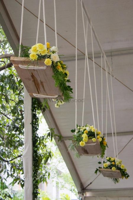 Hanging flowers on a swing