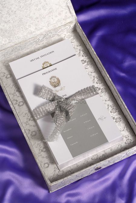 Photo of silver and white card