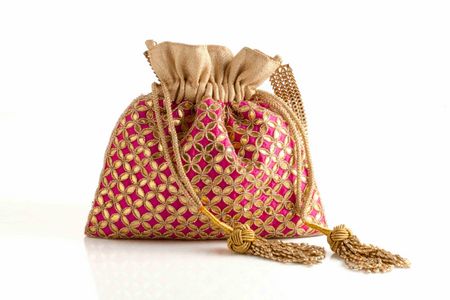 pink and gold potli bag