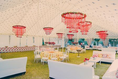 Red floral chandeliers in day decor