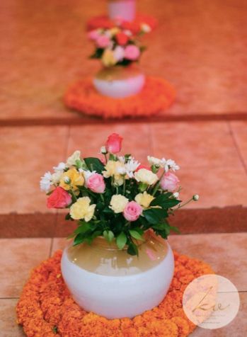 Pickle jars used as vases for the entrance decor