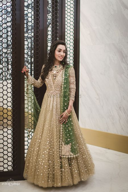 Photo of Gold anarkali with green dupatta