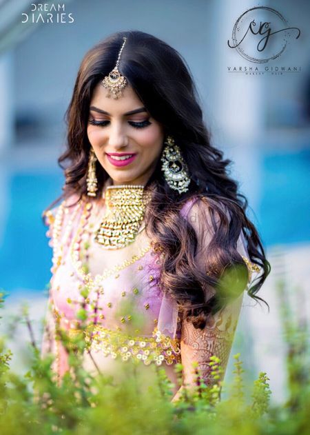 Mehendi bridal makeup with open hair 