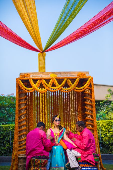 Mehendi swing decor with marigolds