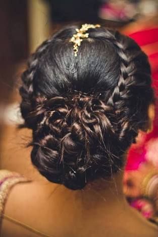 Braided bun hairstyle for reception 