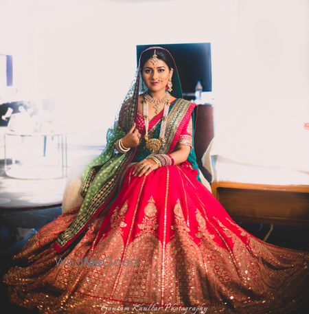 Gorgeous bridal lehenga in fuschia pink and green