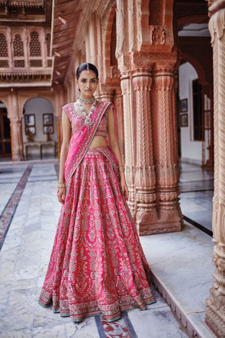 Photo of Pink lehenga with green border for mehendi by Anita dongre