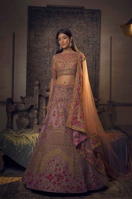 Photo of Shades of pink lehenga with gold detailings