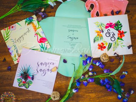 Modern wedding invitation with tropical theme