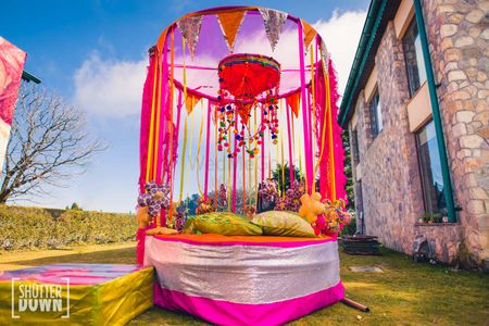 Mehendi decor idea with cute bridal seat