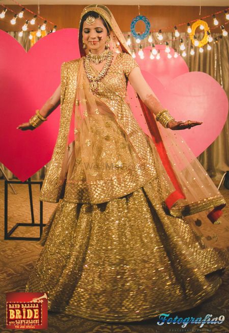 Photo of gold bridal lehenga