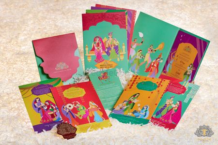 Photo of Bright and colorful wedding invitation cards