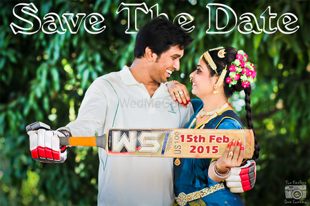 Photo of funny save the datem bride and groom holding bat