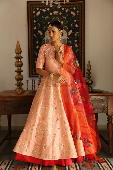 Photo of Summery anarkali in light peach and red for mehendi
