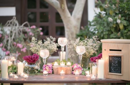 Candle lit and floral decor with personalized elements