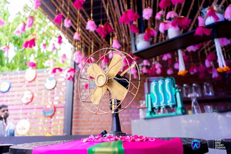 Photo of Quirky vintage theme decor with fan and florals