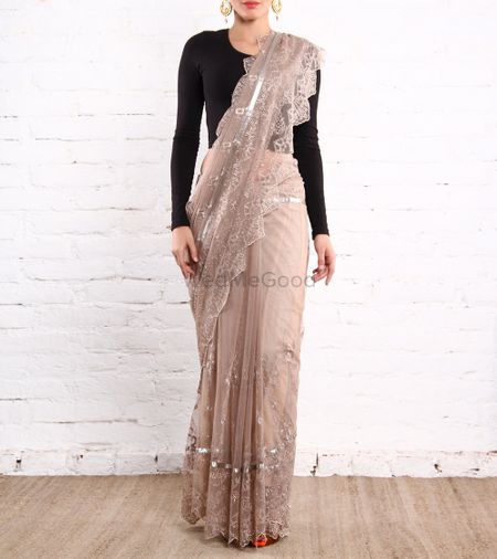 Photo of crop top blouse with grey lace saree