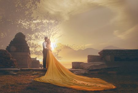 Dramatic pre wedding shoot with outfit and a train