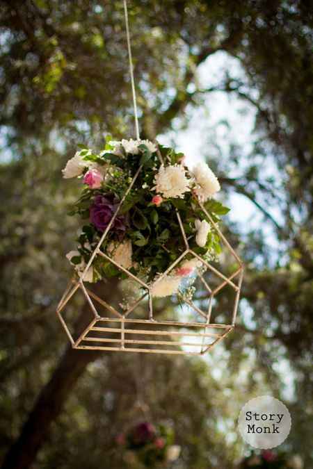 Hanging floral decor in geometric orb 