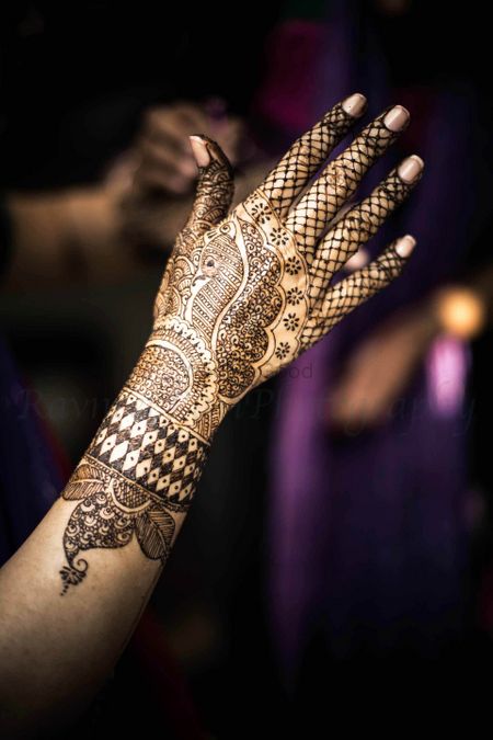 Simple bridal mehendi with jail and peacock design