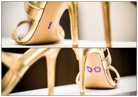 Photo of Unique bridal accessory with I do written under shoes