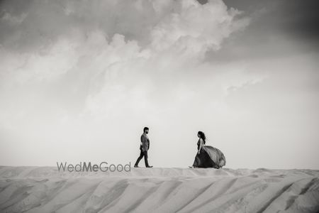 Photo of Black and white pre wedding shoot in desert