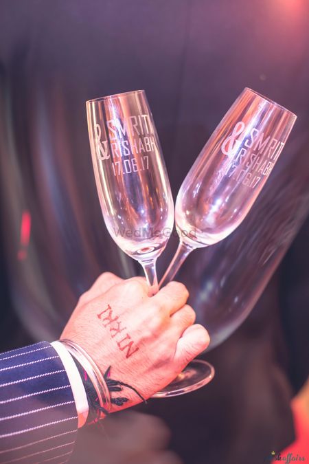 Photo of Personalised champagne glasses with date and name of couple