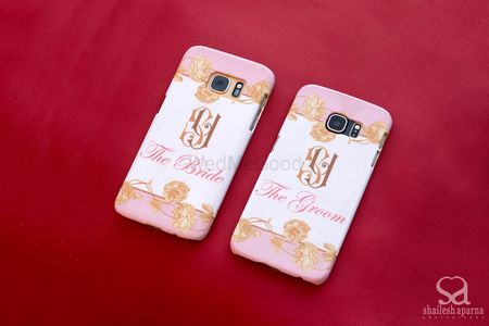 Bride and groom phone covers in white and light pink