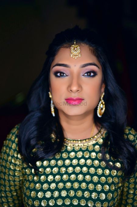 Photo of Pretty south indian bridal portrait while getting ready
