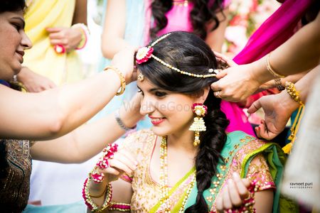 Photo of candid bride to be shot on mehendi day