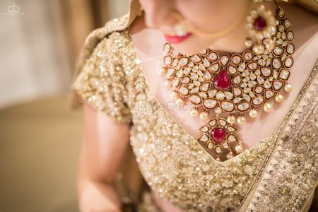 Gold and red bridal necklace with pearl drops