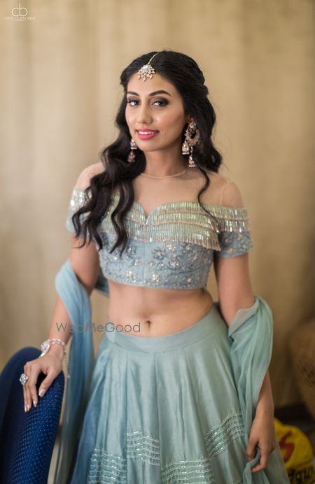 Tiffany blue lehenga with fringed off shoulder blouse