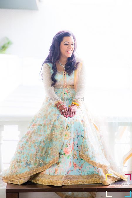 Pastel Floral Lehenga with Net Jacket and Gold Border
