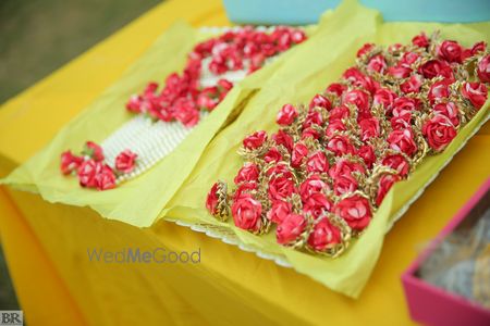 Photo of Floral and gota jewellery favours for mehendi