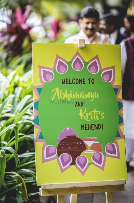 Mehendi entrance decor with printed board