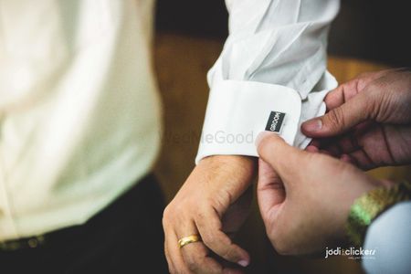 Photo of Unique cufflinks with groom written on them