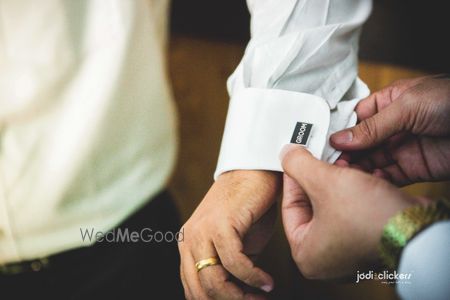 Photo of Unique cufflinks with groom written on them