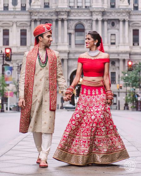 Red bridal lehenga with off shoulder blouse and no dupatta
