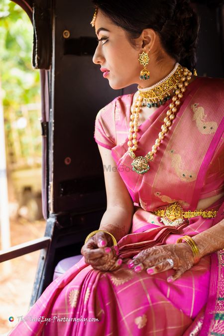 Pink kanjivaram saree with choker and layered necklace