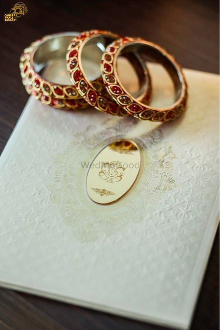 Photo of Wedding cards with jewellery